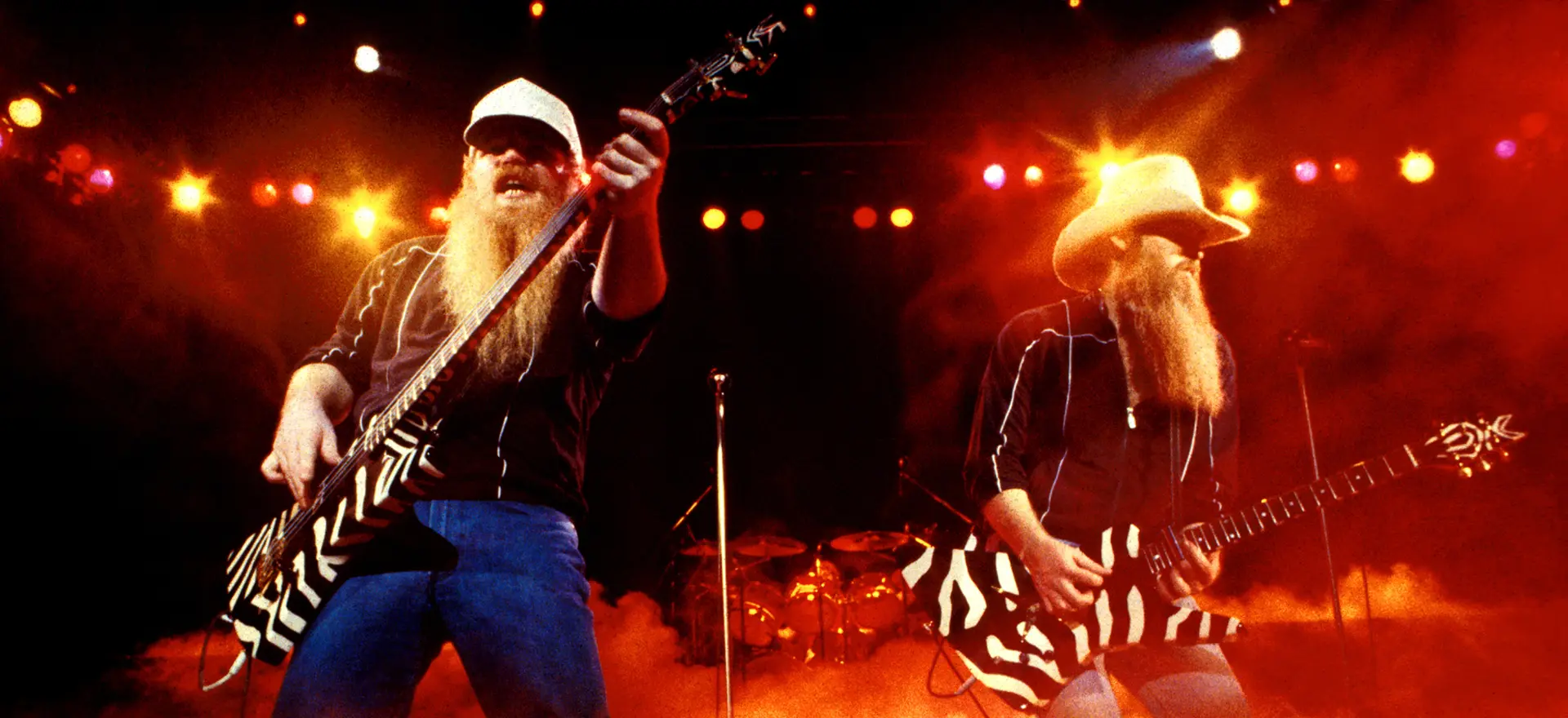 ZZ Top’s Billy Gibbons & Dusty Hill live at the Hammersmith Odeon 1983 – capturing rock ‘n’ roll at its very best – loud, orange and red electrifying on-stage lighting